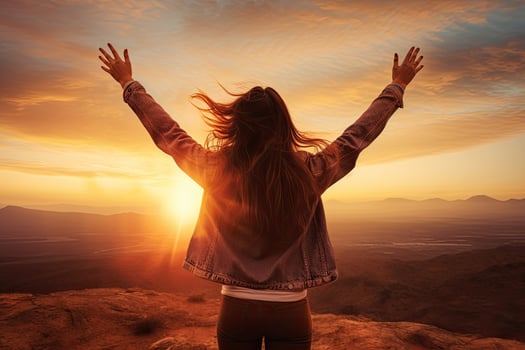 Happy young woman with raised hands standing on top of the mountain at sunset, Excited girl standing and celebrating success on a sunset background, Full rear view, high hands over head, AI Generated photo