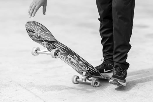 Photography to theme skateboarder riding skateboard in skatepark photo
