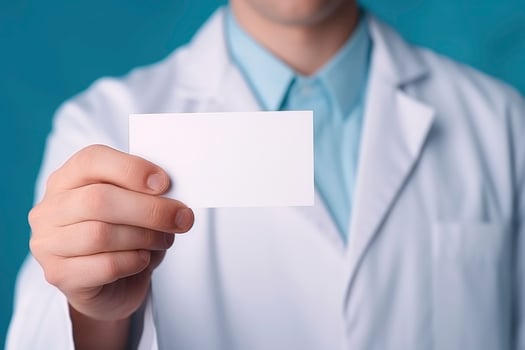 AI generated Man doctor hand holds empty white card with mockup photo