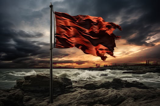 Surrender flag waving in wind beneath a stormy ominous sky photo