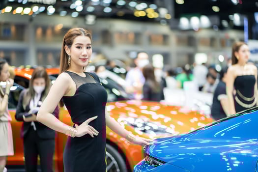 Nonthaburi, Thailand - MAR 26, 2023 Unidentified model poses with a car at The 44th Bangkok international motor show 2023 at IMPACT Arena, Muang Thong Thani, Nonthaburi, Thailand. photo