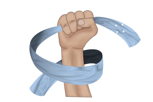 3D Flag on ribbon in hand photo