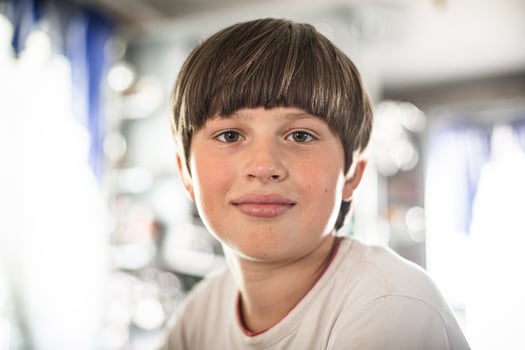boy was cut at home. hair of child who was cut without hairdresser. Lifestyle during coronavirus. photo