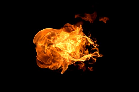 Fire flames on a black background photo