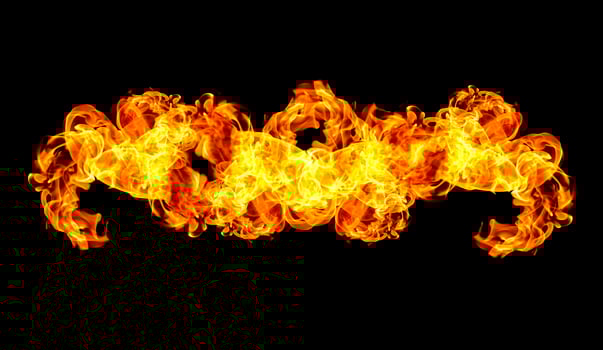 Fire flames on a black background photo