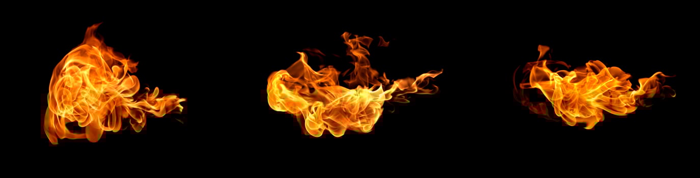 Fire flames on a black background photo