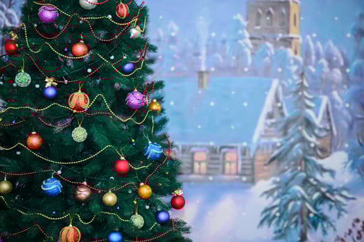 Christmas tree in kindergarten. Christmas tree with colored ball photo