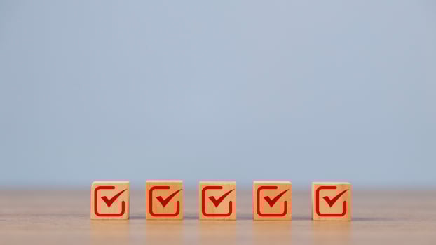 Checklist, Check mark icons for the jobs list on the wooden blocks. Task lists, Surveys, Assessments, Lists, Confirm items, Quality Control goals achievement of business success. photo