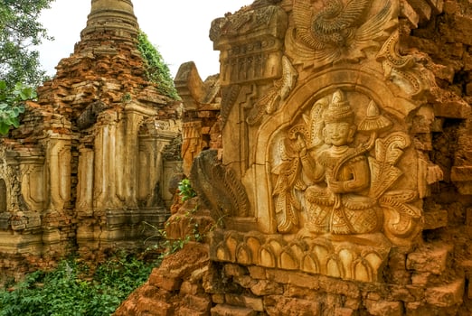 Ruined Buddhist pagodas in the village of Nyaungschwe - Inle Lake - Eastern Myanmar, Asia photo