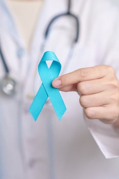 Blue November Prostate Cancer Awareness month, Doctor with Blue Ribbon in hospital for support people life and illness. Healthcare, International men, Father, Diabetes and World cancer day photo