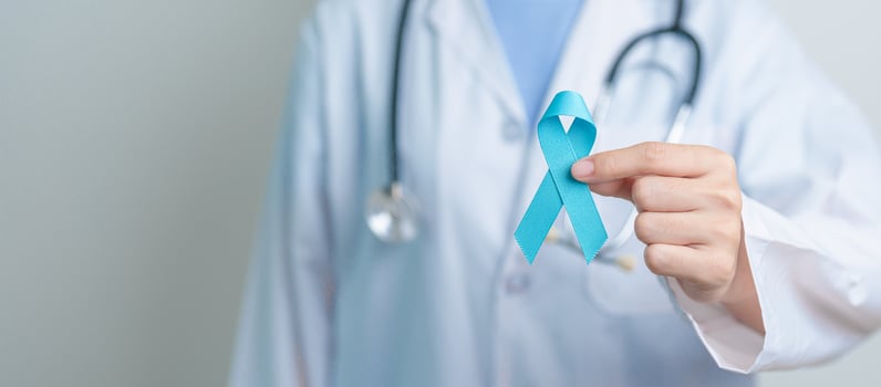 Blue November Prostate Cancer Awareness month, Doctor with Blue Ribbon in hospital for support people life and illness. Healthcare, International men, Father, Diabetes and World cancer day photo