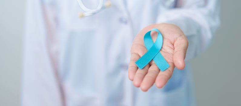 Blue November Prostate Cancer Awareness month, Doctor with Blue Ribbon in hospital for support people life and illness. Healthcare, International men, Father, Diabetes and World cancer day photo