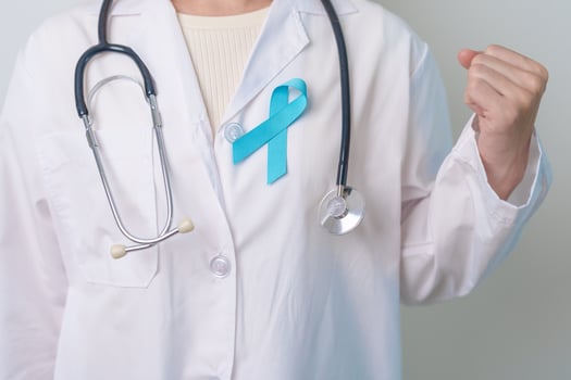 Blue November Prostate Cancer Awareness month, Doctor with Blue Ribbon in hospital for support people life and illness. Healthcare, International men, Father, Diabetes and World cancer day photo