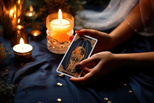 Woman's hand holding a tarot card. Fortune teller reading tarot cards. Generative AI photo