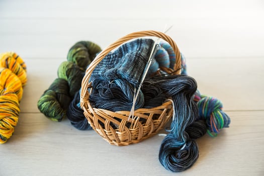 Colored threads, knitting needles and other items for hand knitting photo