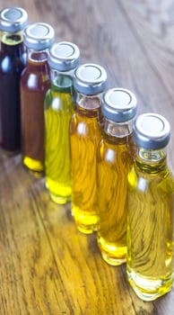 Bottles with different kinds of vegetable oil photo