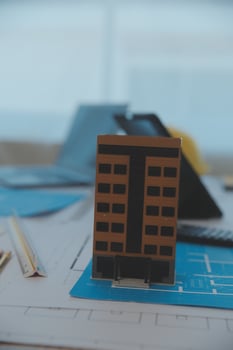Construction and structure concept of Engineer or architect meeting for project working with partner and engineering tools on model building and blueprint in working site, contract for both companies. photo
