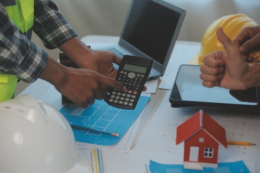 Construction and structure concept of Engineer or architect meeting for project working with partner and engineering tools on model building and blueprint in working site, contract for both companies. photo