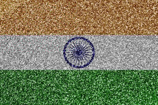 India flag depicted on many small shiny sequins. Colorful festival background for party photo