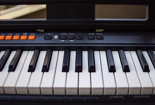 Close-up of piano keys. Piano black and white keys and Piano keyboard musical instrument placed at the home balcony during sunny day. photo