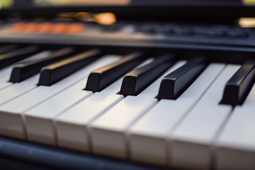 Close-up of piano keys. Piano black and white keys and Piano keyboard musical instrument placed at the home balcony during sunny day. photo