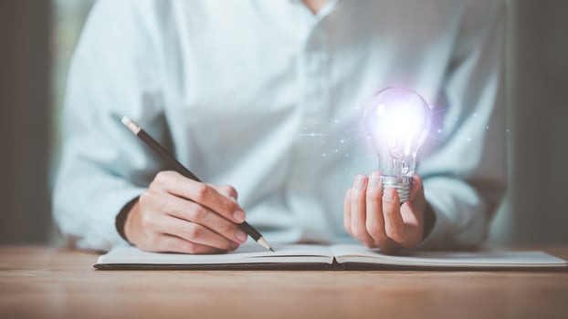 The concept of education adds new skills ,business education ,professional courses ,Young businessman taking notes and information from learning new things in professional seminar photo