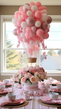 Whimsical hot air balloon centerpiece with flowers and ribbons photo