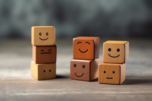 A wooden block label with happy smile relax face good feedback customer. World mental health day concept by AI Generated photo