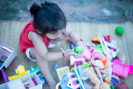 Children play with colorful toys Children play educational and creative toys and games for young children at home. photo