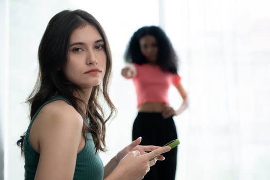 Young woman using smartphone in living room at home with a friend who is looking forward to asking for reconciliation, The concept of love LGBT photo