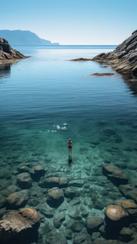 A serene shot of a lone swimmer in a crystal-clear pool photo