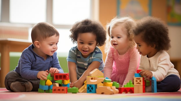 A group of children playing together and building with wooden blocks. photo