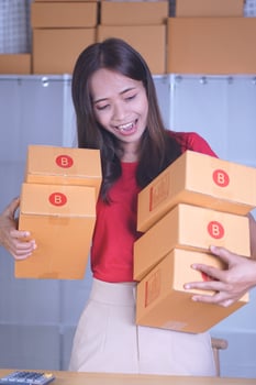 Online sellers check product quantities. before sending products to customers photo