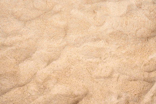 Sand texture background. Close up of beach sand background. Top view. photo