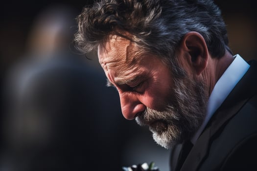 closeup shot of a senior man in front of a funeral bouquet AI generated photo