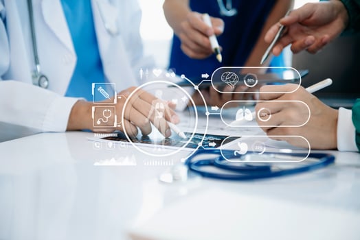 Medical technology network team meeting concept. Doctor hand working with smart phone modern digital tablet and laptop computer with graphics chart interface, with virtual icon photo