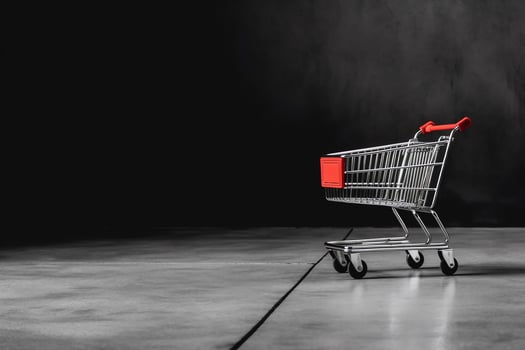 Composition of black friday shopping cart with gift boxes or bags on dark background and copy space concept by AI Generated photo