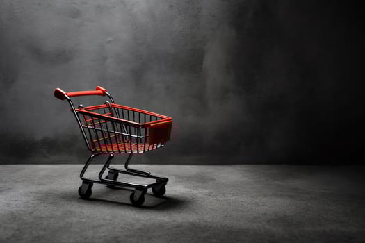 Composition of black friday shopping cart with gift boxes or bags on dark background and copy space concept by AI Generated photo