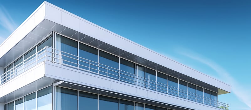 Modern office building with glass windows and balconies photo