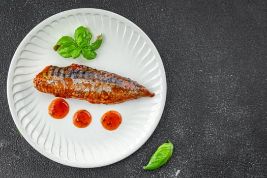 mackerel in tomato sauce and basil fresh canned fish delicious seafood healthy eating cooking appetizer meal food snack on the table copy space photo