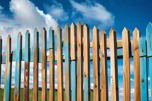 a wooden fence with blue and green paint. AI-Generated photo
