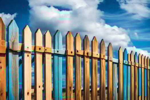 a wooden fence with blue sky and clouds. AI-Generated photo