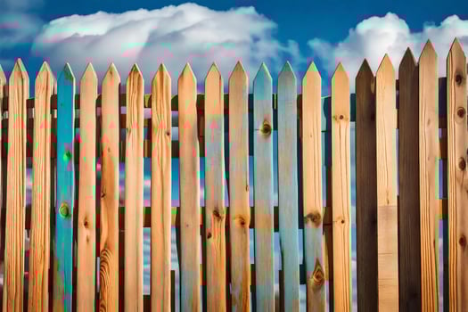 a wooden fence with blue paint on it. AI-Generated photo
