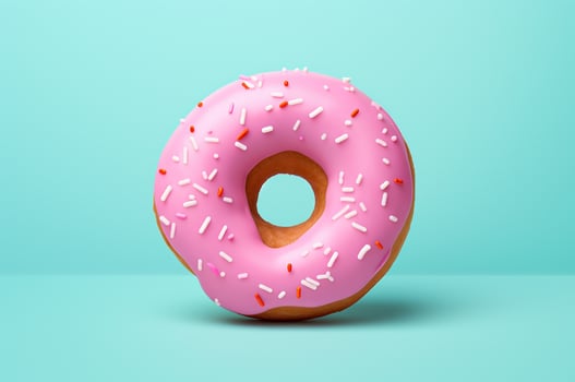 Side view of a pink donut with icing on a mint background. Barbicore. Generative AI photo