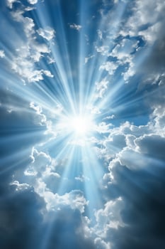 Mystical light beams piercing through dense clouds background with empty space for text photo