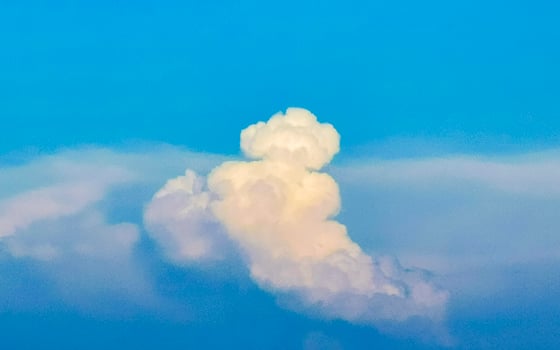 Explosive cloud formation cumulus clouds in the sky in Mexico. photo