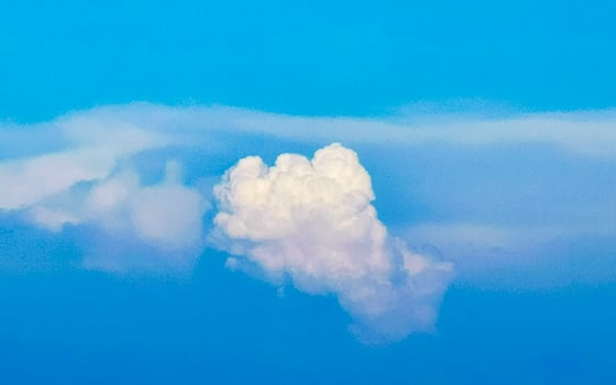 Explosive cloud formation cumulus clouds in the sky in Mexico. photo