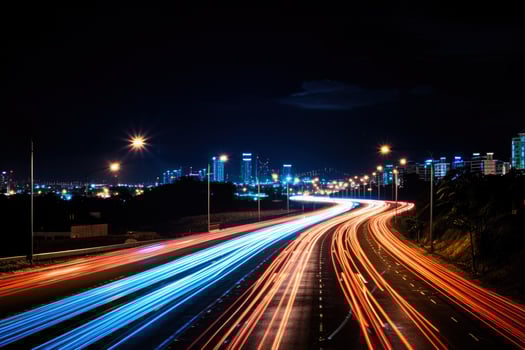 A night scene of a highway captured with long exposure photo