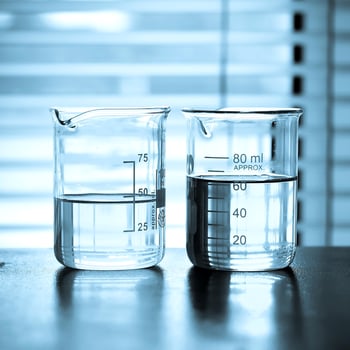Laboratory glassware at lab background in blue tone photo