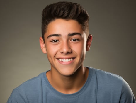 Smiling young man of Mexican descent against neutral background AI Generative photo